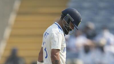 India's Virat Kohli walks off the field after losing his wicket on day two of the second cricket Test against New Zealand in Pune on Friday. (AP) India's Virat Kohli walks off the field after losing his wicket on day two of the second cricket Test against New Zealand in Pune on Friday. (AP)