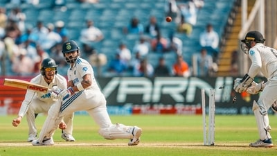 India's Virat Kohli being bowled by New Zealand's Mitchell Santner on the second day of the second test (PTI) India's Virat Kohli being bowled by New Zealand's Mitchell Santner on the second day of the second test (PTI)