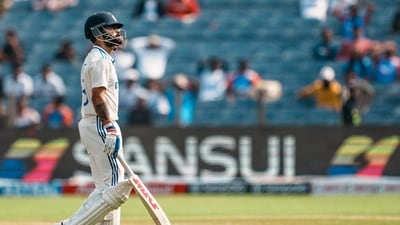 India's Virat Kohli returns to pavilion after being dismissed by New Zealand's Mitchell Santner on the second day of the second test cricket match between India and New Zealand, at the Maharashtra Cricket Association Stadium, in Pune, Friday, Oct. 25, 2024 (PTI) India's Virat Kohli returns to pavilion after being dismissed by New Zealand's Mitchell Santner on the second day of the second test cricket match between India and New Zealand, at the Maharashtra Cricket Association Stadium, in Pune, Friday, Oct. 25, 2024 (PTI)