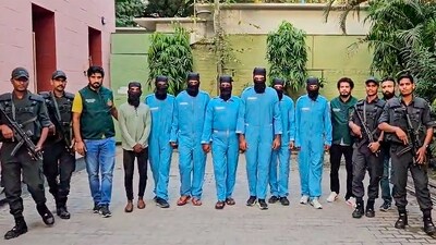 7 criminals of Lawrence and Anmol Bishnoi gang after their arrest by the Special Cell of the Delhi Police from various places, in New Delhi, Friday. (PTI) 7 criminals of Lawrence and Anmol Bishnoi gang after their arrest by the Special Cell of the Delhi Police from various places, in New Delhi, Friday. (PTI)