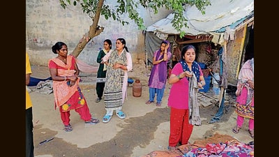The deceased’s kin at their home in Ludhiana on Friday. (HT Photo)