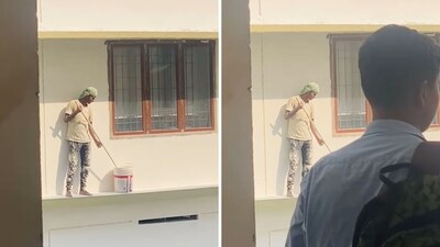 The image shows the aall painter standing still as he hears the national anthem. (Screengrab)