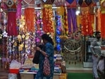Diwali falls on Thursday, October 31, and the preparations are in full swing. A market in Thane is decorated for the Diwali festivities, and people are seen doing Diwali shopping days before the Hindu festival. (HT Photo/ Praful Gangurde)
