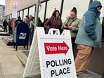 People stand in line waiting to cast ballots during early voting in the general election on a cool and windy day, Friday, Oct. 25, 2024, in Anchorage, Alaska. People stand in line waiting to cast ballots during early voting in the general election on a cool and windy day, Friday, Oct. 25, 2024, in Anchorage, Alaska.