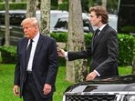 Former US President Donald Trump and his son Barron Trump. (Photo by GIORGIO VIERA / AFP)