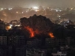 Smoke billows over Beirut's southern suburbs, after an Israeli strike, amid the ongoing hostilities between Hezbollah and Israeli forces, as seen from Baabda, Lebanon, on October 25,