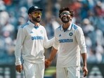 India's Ravindra Jadeja celebrates with Virat Kohli after taking the wicket of New Zealand's Ajaz Patel on the third day of the second test cricket match between India and New Zealand, at the Maharashtra Cricket Association Stadium India's Ravindra Jadeja celebrates with Virat Kohli after taking the wicket of New Zealand's Ajaz Patel on the third day of the second test cricket match between India and New Zealand, at the Maharashtra Cricket Association Stadium