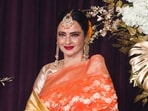 Rekha continues to wow with her beauty. She poses for pictures during designer Manish Malhotra's Diwali party on October 22. (File Photo/PTI)
