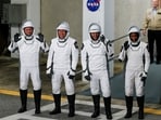 NASA's SpaceX Crew-8 astronauts Matthew Dominick, Michael Barratt, and Jeanette Epps, and Roscosmos cosmonaut Alexander Grebenkin, depart their crew quarters for the launch pad before their mission to the International Space Station, aboard a SpaceX Falcon 9 rocket from the Kennedy Space Center in Cape Canaveral,  Florida, U.S., March 3, 2024.