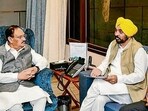 Union minister of chemicals and fertilizers JP Nadda with Punjab chief minister Bhagwant Mann at the meeting in New Delhi. (PTI) Union minister of chemicals and fertilizers JP Nadda with Punjab chief minister Bhagwant Mann at the meeting in New Delhi. (PTI)