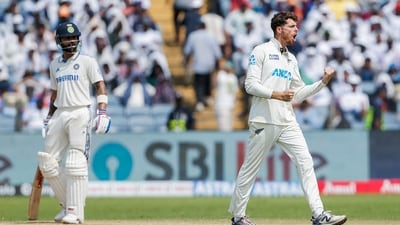 New Zealand's Mitchell Santner celebrates the wicket of India's Yashasvi Jaiswal during Day 3 of the second Test (Surjeet Yadav) New Zealand's Mitchell Santner celebrates the wicket of India's Yashasvi Jaiswal during Day 3 of the second Test (Surjeet Yadav)