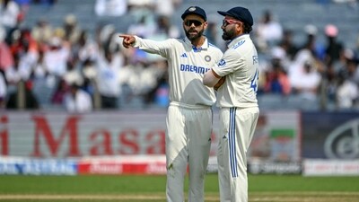 India's Virat Kohli talks with his captain Rohit Sharma (R) during the second day of the second Test cricket match between India and New Zealand at the Maharashtra Cricket Association Stadium in Pune on October 25, 2024 (AFP) India's Virat Kohli talks with his captain Rohit Sharma (R) during the second day of the second Test cricket match between India and New Zealand at the Maharashtra Cricket Association Stadium in Pune on October 25, 2024 (AFP)