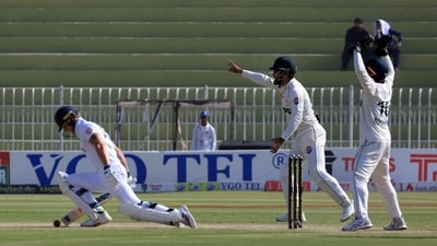 Pakistan players appeal successfully for the wicket of England's Ben Stokes, lbw bowled by Pakistan's Noman Ali (REUTERS)