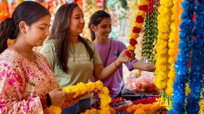 Shoppers buy decorative items at a market in Amritsar ahead of the Diwali festival on October 25. People decorate their homes with flowers and rangolis during the festival. (PTI) Shoppers buy decorative items at a market in Amritsar ahead of the Diwali festival on October 25. People decorate their homes with flowers and rangolis during the festival. (PTI)