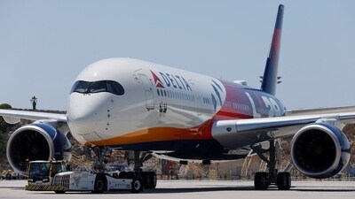 A Delta Airlines jet carrying American athletes and officials and the Olympic flag arrives in Los Angeles, California, U.S. August 12, 2024. (Carlin Stiehl/Reuters)