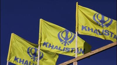 Pro-indepence Khalistan flags are seen at the Guru Nanak Sikh Gurdwara temple, site of the June 2023 killing of Sikh leader Hardeep Singh Nijjar, in Surrey, British Columbia, Canada. (REUTERS)