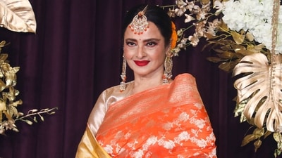 Rekha continues to wow with her beauty. She poses for pictures during designer Manish Malhotra's Diwali party on October 22. (File Photo/PTI) Rekha continues to wow with her beauty. She poses for pictures during designer Manish Malhotra's Diwali party on October 22. (File Photo/PTI)