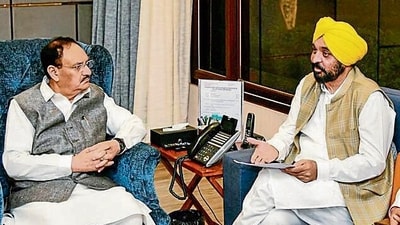 Union minister of chemicals and fertilizers JP Nadda with Punjab chief minister Bhagwant Mann at the meeting in New Delhi. (PTI) Union minister of chemicals and fertilizers JP Nadda with Punjab chief minister Bhagwant Mann at the meeting in New Delhi. (PTI)