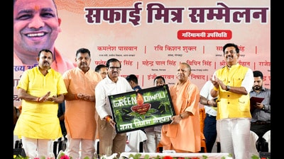Uttar Pradesh Chief Minister Yogi Adityanath and BJP MP Ravi Kishan during the 'Safai Mitra Suraksha' conference, in Gorakhpur (PTI) Uttar Pradesh Chief Minister Yogi Adityanath and BJP MP Ravi Kishan during the 'Safai Mitra Suraksha' conference, in Gorakhpur (PTI)
