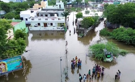 Water from the overflowing Pandalkudi canal enters residential areas leading to severe flooding following heavy rain, at Karisalkulam in Madurai. (ANI) Water from the overflowing Pandalkudi canal enters residential areas leading to severe flooding following heavy rain, at Karisalkulam in Madurai. (ANI)