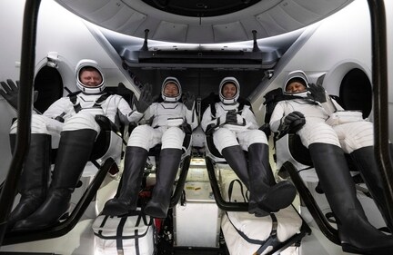 This photo provided by NASA shows Roscosmos cosmonaut Alexander Grebenkin, left, NASA astronauts Michael Barratt, second from left, Matthew Dominick, second from right, and Jeanette Epps, right, inside the SpaceX Dragon Endeavour spacecraft onboard the SpaceX recovery ship MEGAN shortly after having landed in the Gulf of Mexico off the coast of Pensacola, Florida, Friday, Oct. 25, 2024. (AP) This photo provided by NASA shows Roscosmos cosmonaut Alexander Grebenkin, left, NASA astronauts Michael Barratt, second from left, Matthew Dominick, second from right, and Jeanette Epps, right, inside the SpaceX Dragon Endeavour spacecraft onboard the SpaceX recovery ship MEGAN shortly after having landed in the Gulf of Mexico off the coast of Pensacola, Florida, Friday, Oct. 25, 2024. (AP)