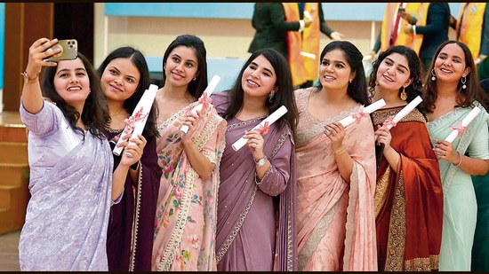 Young doctors pose for a selfie after receiving their degrees during convocation ceremony at Dayanand Medical College and Hospital in Ludhiana on Saturday. (Manish/HT)