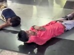 Injured passengers after a stampede at Bandra railway station, in Mumbai, Sunday,