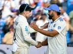 New Zealand's captain Tom Latham (L) is congratulated by his Indian counterpart Rohit Sharma for their team's win at the end of the third day of the second Test cricket match between India and New Zealand in the Maharashtra Cricket Association Stadium of Pune on October 26 New Zealand's captain Tom Latham (L) is congratulated by his Indian counterpart Rohit Sharma for their team's win at the end of the third day of the second Test cricket match between India and New Zealand in the Maharashtra Cricket Association Stadium of Pune on October 26