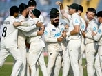 New Zealand players celebrate after their team's win against India. (Photo by Punit PARANJPE / AFP) / New Zealand players celebrate after their team's win against India. (Photo by Punit PARANJPE / AFP) /