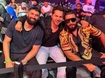Varun Dhawan, Aditya Roy Kapur and Ranveer Singh pose together at an event in the UAE.