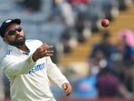 Rohit Sharma throws the ball during the day one of the second cricket Test match between India and New Zealand. Rohit Sharma throws the ball during the day one of the second cricket Test match between India and New Zealand.