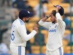 Rohit Sharma and Kuldeep Yadav during the fifth day of the first Test cricket match between India and New Zealand.(PTI)