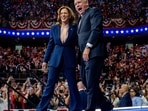 U.S. Vice President Kamala Harris and Democratic vice presidential nominee Minnesota Gov. Tim Walz walk 