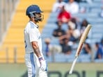 India's Virat Kohli walks back to the pavilion after getting dismissed by Mitchell Santner during Day 3 of the second Test. India's Virat Kohli walks back to the pavilion after getting dismissed by Mitchell Santner during Day 3 of the second Test.