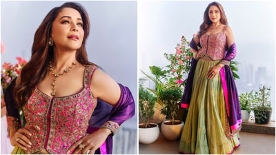 Madhuri Dixit’s stylish lehenga ensemble is perfect for those who prefer lighter festive attire. She wore a pink sleeveless blouse paired with a light green skirt and a contrasting purple dupatta, creating a vibrant look. (Instagram) Madhuri Dixit’s stylish lehenga ensemble is perfect for those who prefer lighter festive attire. She wore a pink sleeveless blouse paired with a light green skirt and a contrasting purple dupatta, creating a vibrant look. (Instagram)