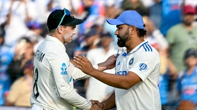 New Zealand's captain Tom Latham (L) is congratulated by his Indian counterpart Rohit Sharma for their team's win at the end of the third day of the second Test cricket match between India and New Zealand in the Maharashtra Cricket Association Stadium of Pune on October 26 (AFP) New Zealand's captain Tom Latham (L) is congratulated by his Indian counterpart Rohit Sharma for their team's win at the end of the third day of the second Test cricket match between India and New Zealand in the Maharashtra Cricket Association Stadium of Pune on October 26 (AFP)
