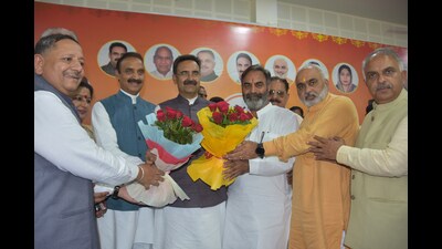 Haryana assembly speaker and Gharunda MLA Harvinder Kalyan with others during an event.