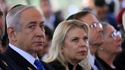 Israel's Prime Minister Benjamin Netanyahu, his wife Sara Netanyahu, President Isaac Herzog and First Lady Michal Herzog attend a memorial ceremony of the Hamas attack on October 7 last year that sparked the ongoing war in Gaza, at the Mount Herzl military cemetery in Jerusalem on October 27, 2024. (via REUTERS)