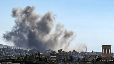 Smoke billows from the site of an Israeli airstrike that targeted Lebanon's eastern city of Baalbeck in the Bekaa valley. (AFP) Smoke billows from the site of an Israeli airstrike that targeted Lebanon's eastern city of Baalbeck in the Bekaa valley. (AFP)