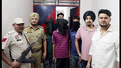 Jalandhar police arrested 4 persons including a PSO of independent MP Amritpal Singh for their involvement in the smuggling of illegal arms, drugs, extortion and others, in Jalandhar on Sunday. (ANI)