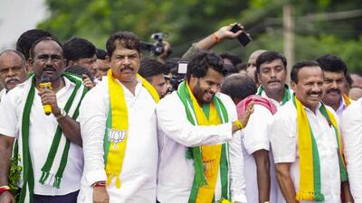 NDA candidate Nikhil Kumaraswamy at a roadshow before filing his nomination on Friday for the Channapatna bypoll. (PTI)