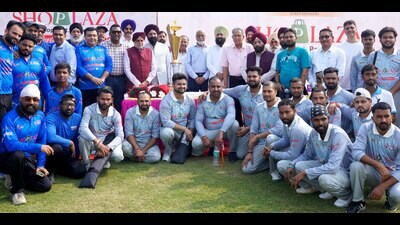 Participants and guests at the 10th CICU Corporate T20 Cricket Tournament that kicked off at the GRD Academy cricket ground, Hambran Road, Ludhiana, on Sunday. (HT Photo)