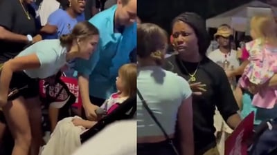 A Harris supporter was caught yelling at a young girl in a stroller (X) A Harris supporter was caught yelling at a young girl in a stroller (X)
