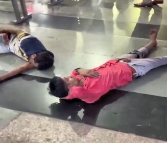 Injured passengers after a stampede at Bandra railway station, in Mumbai, Sunday. (PTI) Injured passengers after a stampede at Bandra railway station, in Mumbai, Sunday. (PTI)