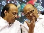 A file photo of Ajit Pawar with uncle Sharad Pawar. A file photo of Ajit Pawar with uncle Sharad Pawar.