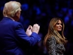 Republican presidential nominee former President Donald Trump, left, claps for former first lady Melania Trump on stage during a campaign rally at Madison Square Garden, Sunday, Oct. 27, 2024, in New York. (AP Photo/Julia Demaree Nikhinson)