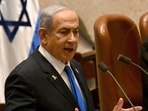 Israeli Prime Minister Benjamin Netanyahu speaks at the opening of the 25th Knesset session marking the anniversary of the "Iron Swords" war, in Jerusalem, Monday, Oct. 28, 2024.