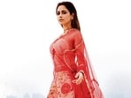 outfit: Asha Gautam
Nushrratt looks stunning in a Pathani lehenga, paired with a pearl-embellished blouse and a delicate net dupatta by Asha Gautam