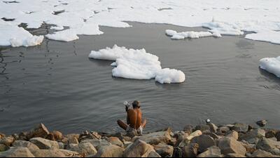 A man bathes in Yamuna – heavily covered with a toxic foam – at Kalindi Kunj on Monday. (Sunil Ghosh/HT Photo) A man bathes in Yamuna – heavily covered with a toxic foam – at Kalindi Kunj on Monday. (Sunil Ghosh/HT Photo)