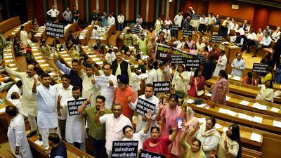 BJP councillors protest during the House meeting at the Civic Centre in New Delhi on Monday. (Arvind Yadav/HT Photo) BJP councillors protest during the House meeting at the Civic Centre in New Delhi on Monday. (Arvind Yadav/HT Photo)